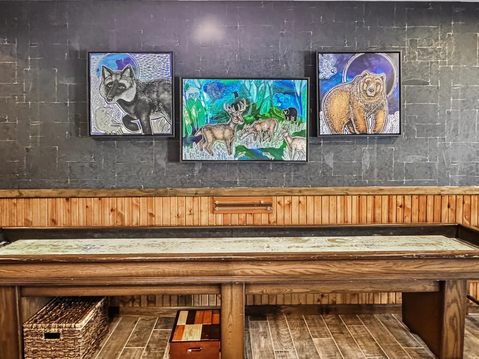 Shuffleboard table in the Black Bear 32 game room
