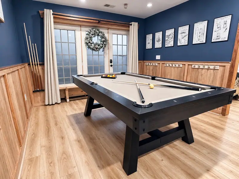 Pool table on the Black Bear 33 game level with navy walls