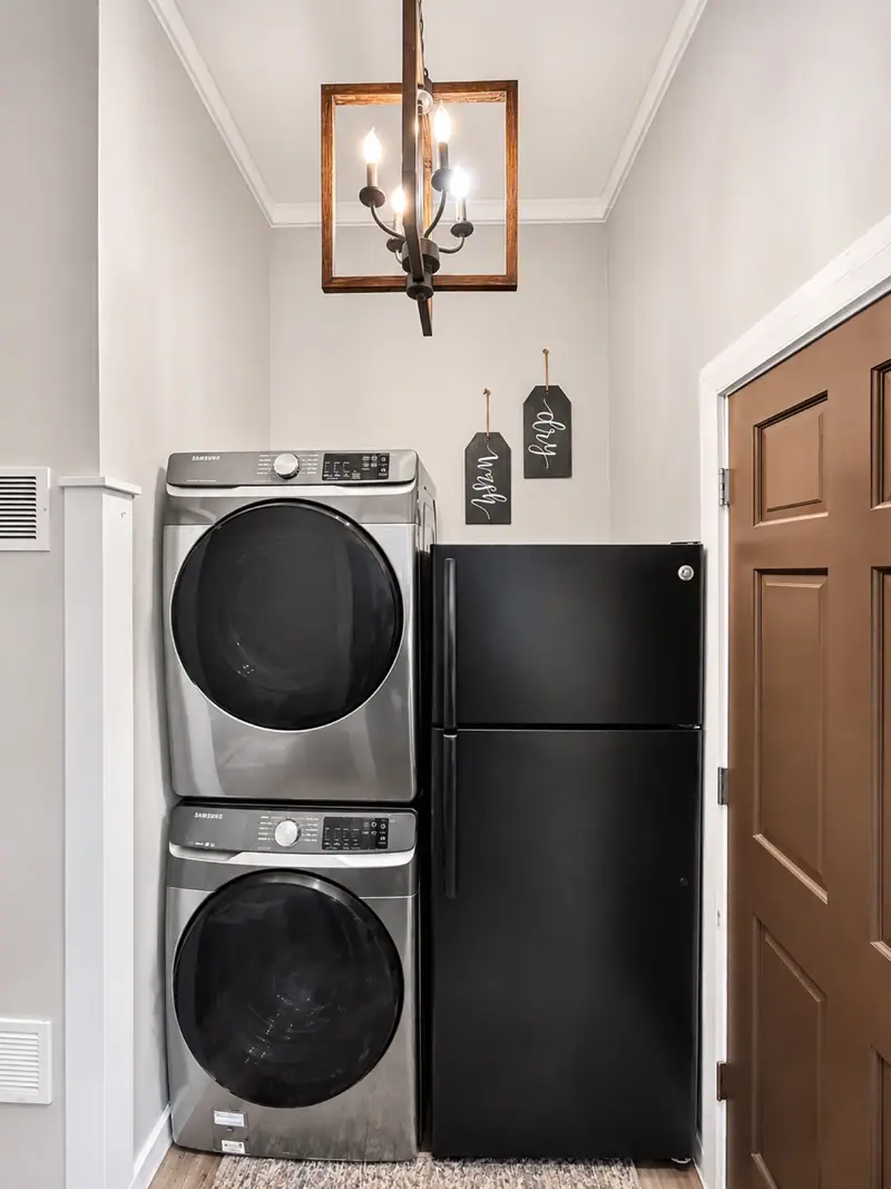 Stacked washer and dryer and a second fridge at Loggers Run 12