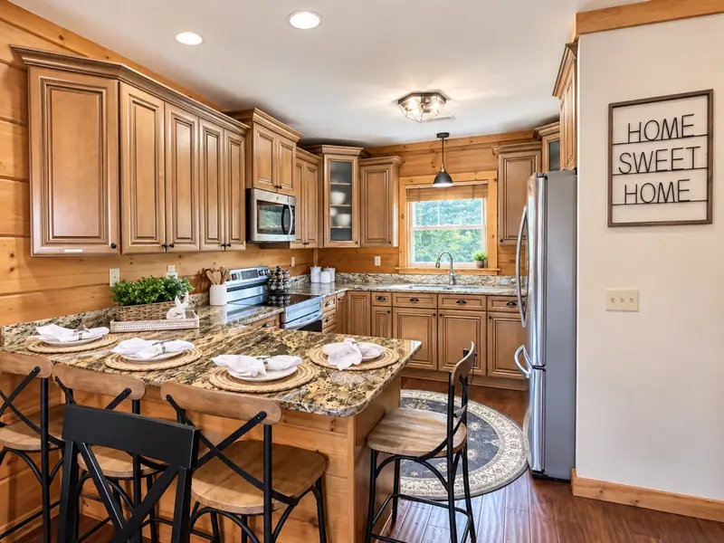 Kitchen island set for breakfast at Loggers Run 16