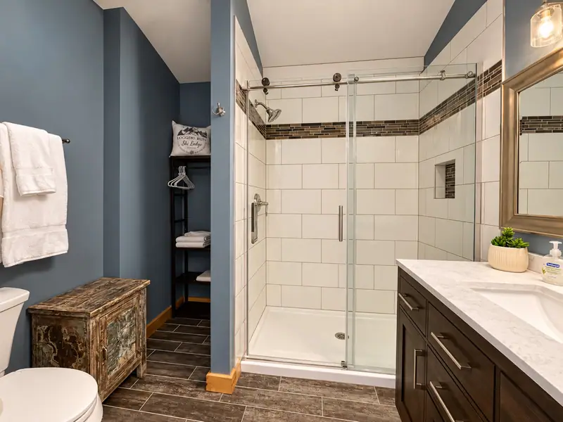 Primary bathroom at Loggers Run 16 with a glass walk-in shower