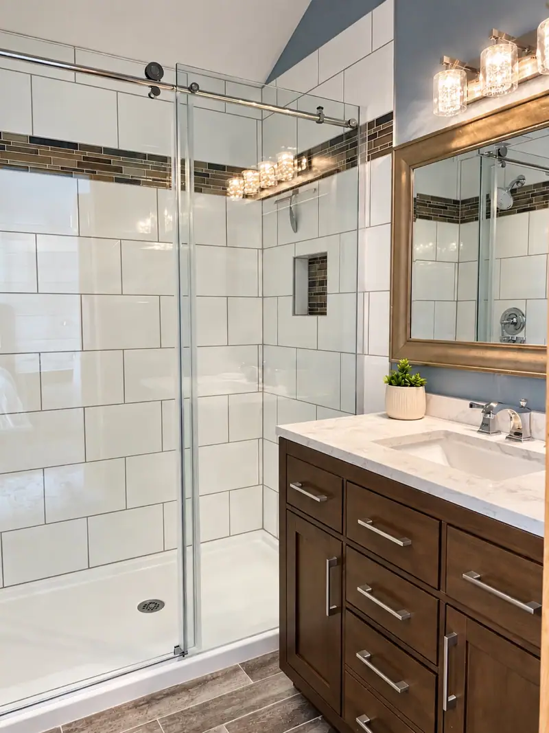 Double vanity and walk-in shower in the Loggers Run 16 primary bath