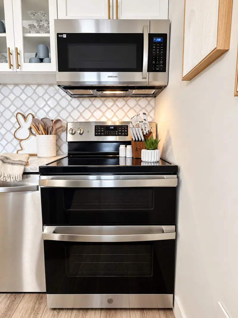 Stainless range and microwave in the Mountain Lodge 114 kitchen