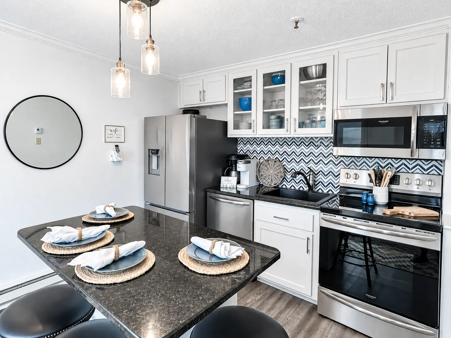 Kitchen at Mountain Lodge 140 with bar seating for four