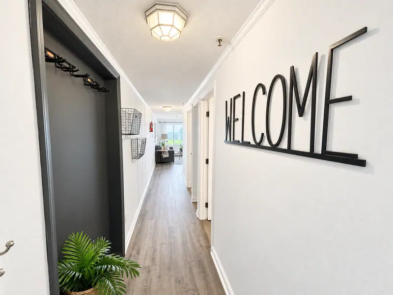 Hallway at Mountain Lodge 140 with a large Welcome sign