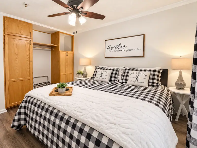 Buffalo check bedroom at Mountain Lodge 140 with a wood closet