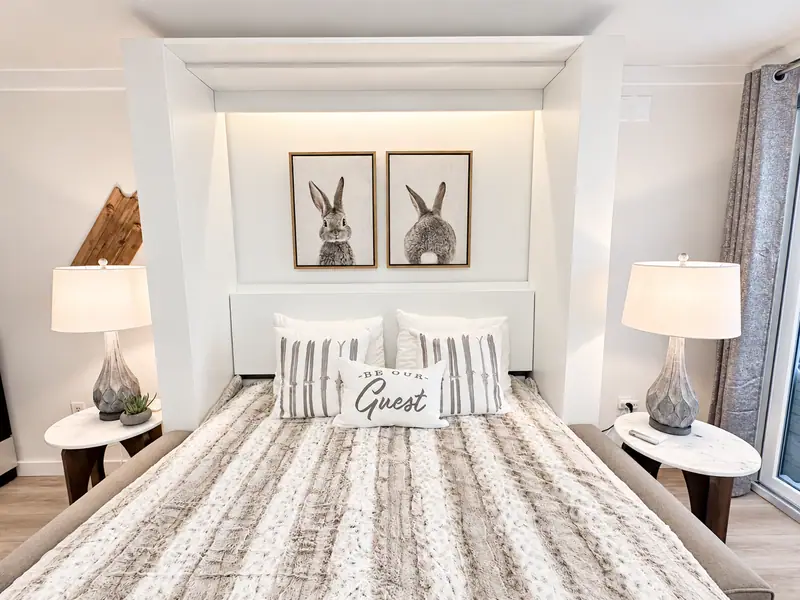 Queen Murphy bed at Mountain Lodge 144 with a Guest pillow and two rabbit prints