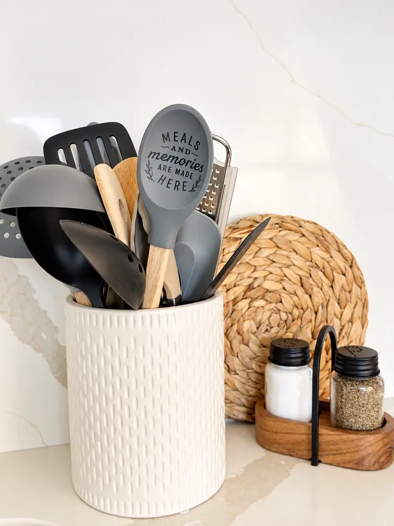 Utensil crock and spice jars on the Mountain Lodge 144 counter