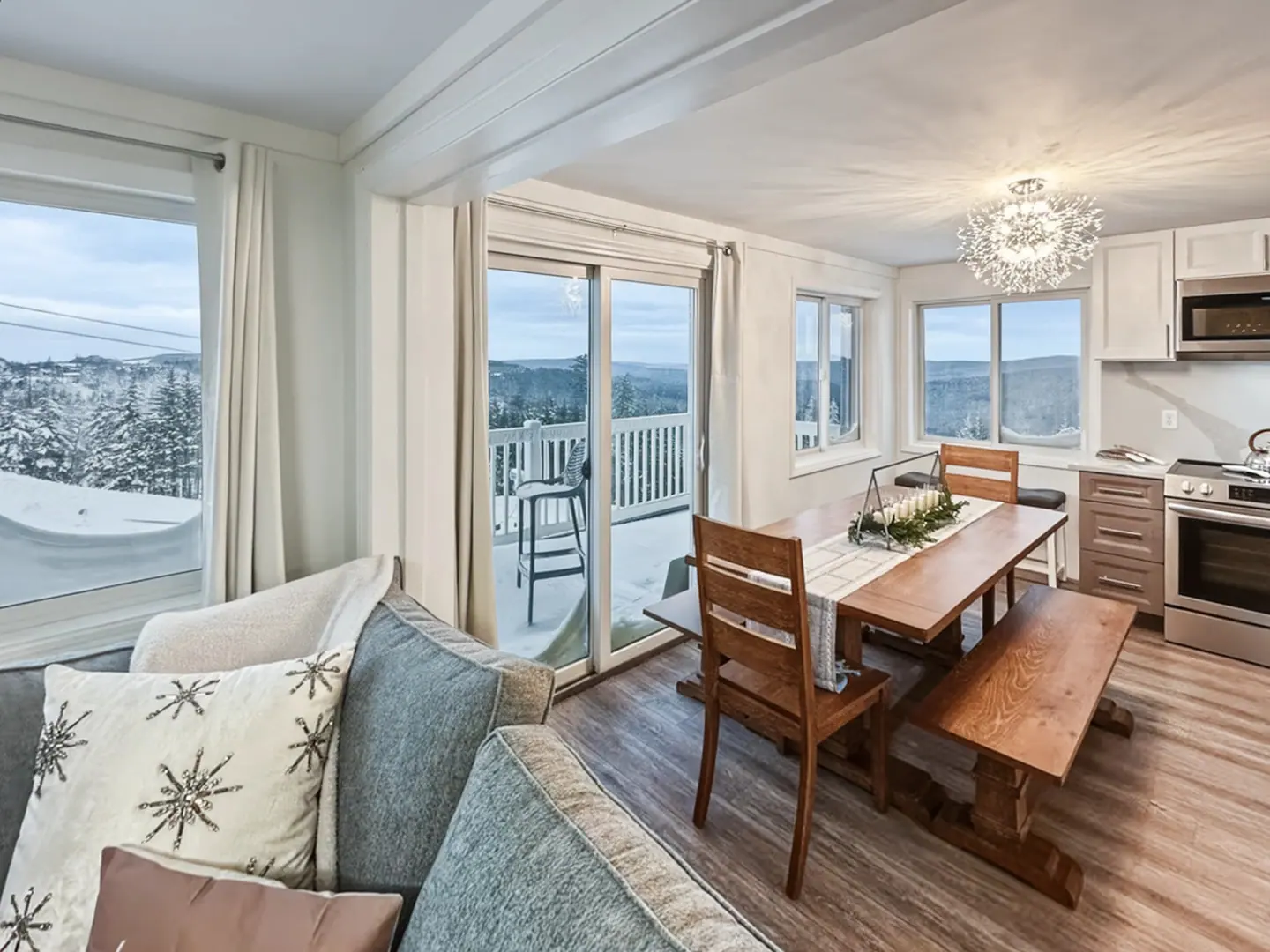 Open living, dining, and kitchen at Mountain Lodge 146
