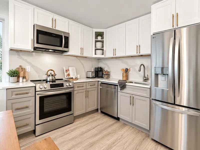 Kitchen at Mountain Lodge 146 with a stainless range, dishwasher and fridge