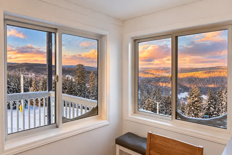 Kitchen windows at Mountain Lodge 146 at sunset