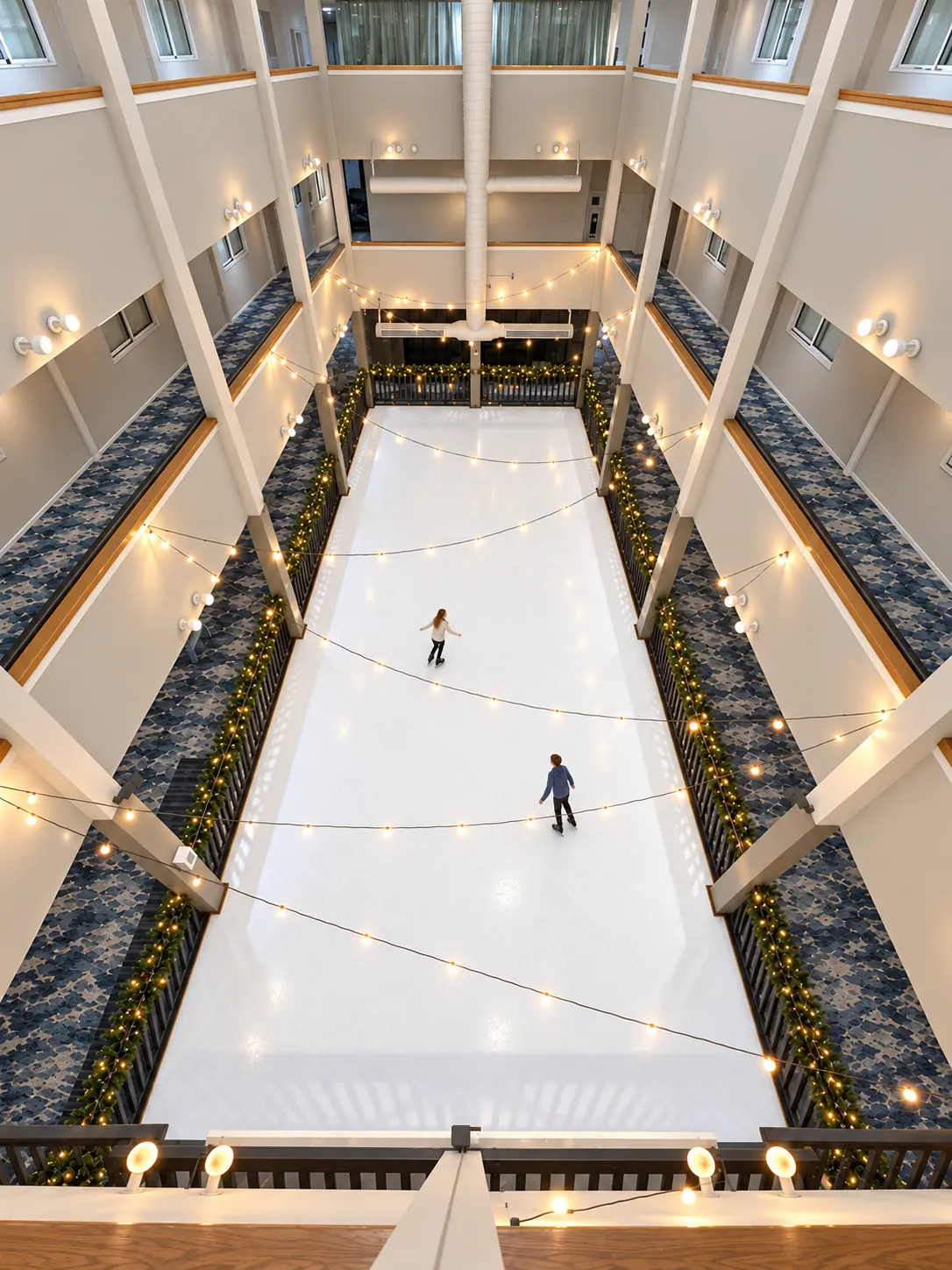 The indoor synthetic ice rink at Mountain Lodge, seen from the floors above