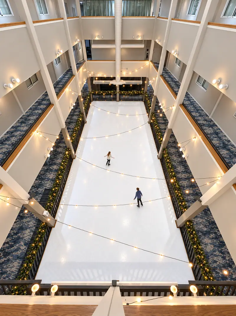 The indoor synthetic ice rink at Mountain Lodge, seen from the floors above