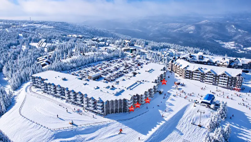 Winter aerial of Mountain Lodge beside the slopes