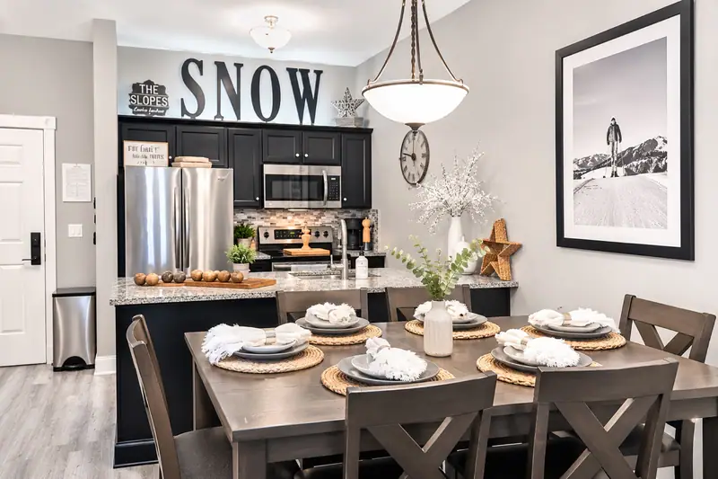 Kitchen and dining table at Seneca 113 under the SNOW sign