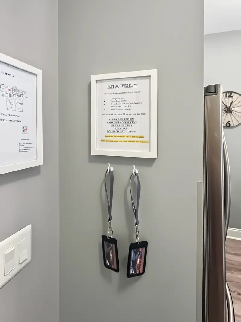 Unit access keys hanging by their instruction sign at Seneca 113