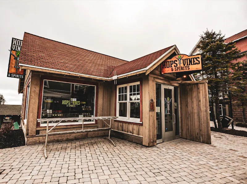 Hops & Vines & Spirits storefront in the Snowshoe Village