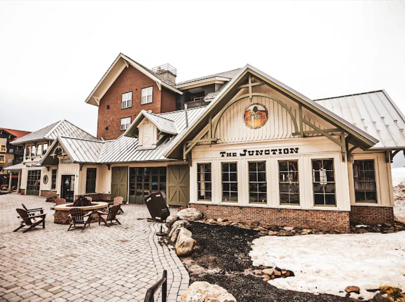 The Junction in the Snowshoe Village, with Adirondack chairs and fire pits out front